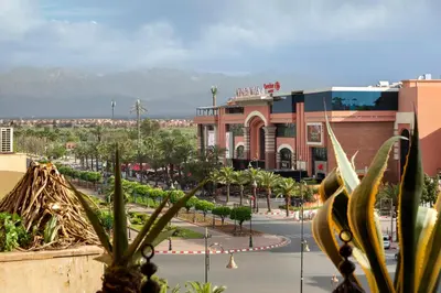 a view of a street in a city with buildings at Appart de luxe Hivernage Menara Mall Gueliz in Marrakech