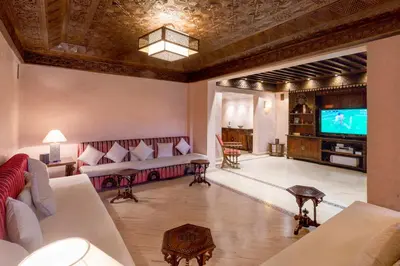a living room with couches and a flat screen tv at Appart de luxe Hivernage Menara Mall Gueliz in Marrakech