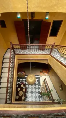 an overhead view of a stairway with a swing at Riyad Entier Avec piscine Red Moon Kech in Marrakech