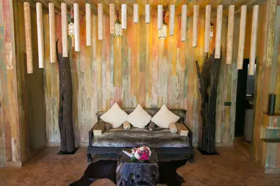 a room with a couch with pillows on it at Lodge K in Marrakech