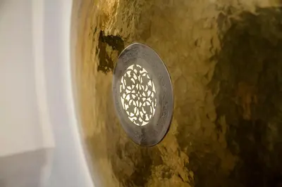 a close up of a metal object with a light on it at Riad Clémentine in Marrakech