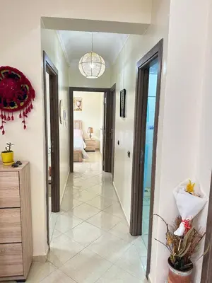 a hallway of a home with a room with a hallway at charming room close to Marrakech airport in Marrakech