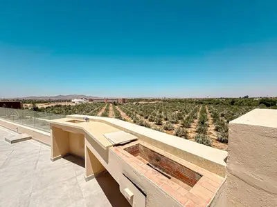 a view from the roof of a house with a view at Villa LEONARDO Piscine & Rooftop Terrase in Marrakech