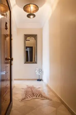 a hallway with a zebra rug on the floor at A stunning 2 bedroom Hivernage in Marrakech