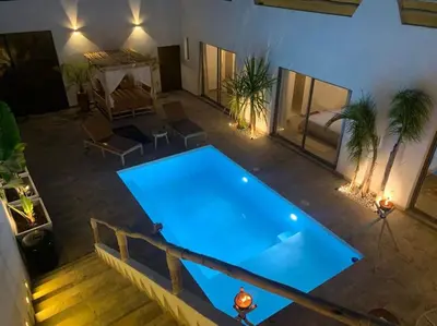 an overhead view of a swimming pool in a room at Magnifique villa sans vis-à-vis • Marrakech in Marrakech
