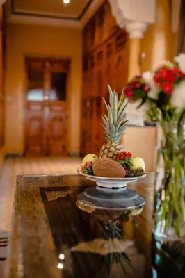 a plate of food on a table with a pineapple on it at Penthouse Marrakech in Marrakech