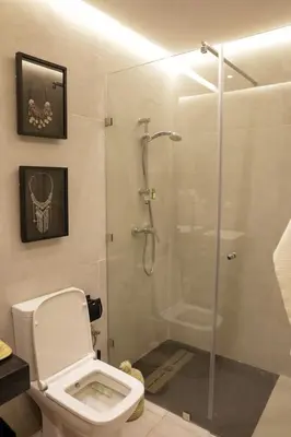 a bathroom with a shower stall and a toilet at S_house in Marrakech