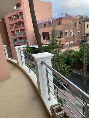 a balcony with a railing in a building at stylish appartment heart of gueliz in Marrakech