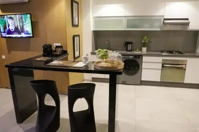 a kitchen with a table with a bowl of food on it at S_house in Marrakech