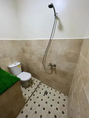 a bathroom with a shower with a toilet in it at Cosy Appart private riad jemaa el fna in Marrakech