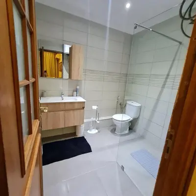 a bathroom with a sink and a toilet at Appartement cosy quartier au centre de Marrakech Gueliz in Marrakech