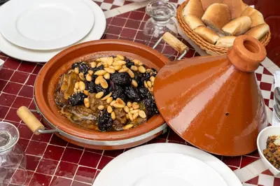 a bowl of food sitting on top of a table at Riad Mandana & Spa in Marrakech