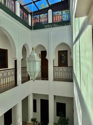 a view from the ceiling of a building with a light fixture at Riad Mandana & Spa in Marrakech