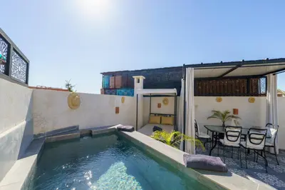 a swimming pool on the roof of a house at Riad AJI 4 Rooms, Pool, Internet, Top Emplacement Médina in Marrakech