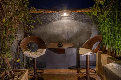 a room with two chairs and a table at Riad Bed & Breakfast Comptoir du Pacha in Marrakech