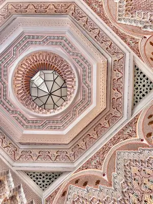 an ornate ceiling of a building with a dome at Riad Azad & Spa in Marrakech