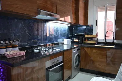 a kitchen with a stove and a counter top at apartment Marrakech, gueliz in Marrakech