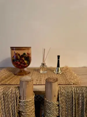 a table with a bowl of food on top of a table at Peekaboo Hostel in Marrakech