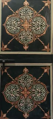 two sets of doors with a design on them at Riad El Badii chambre twin Bahia in Marrakech