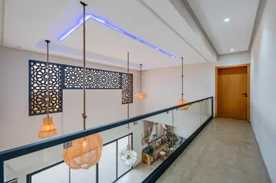 a hallway with pendant lights in a house at Le Palais de l Atlas luxury villa Marrakech in Douar Ouled Ahmed