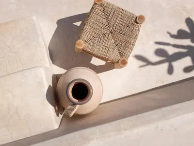 a cup of coffee next to a skateboard on a ramp at Dar Oki in Marrakech