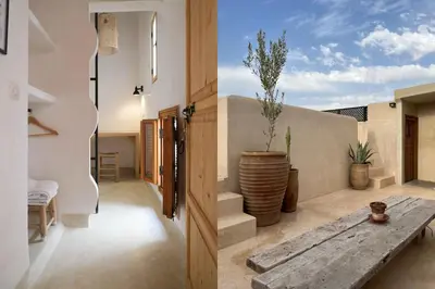 a living room with a wooden table in a house at Dar Oki in Marrakech