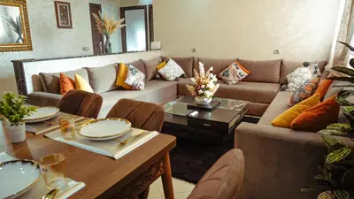a living room with a couch and a table at Apartment in Marrakech in Marrakech