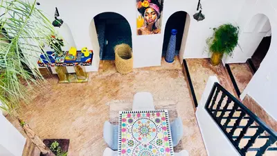 an overhead view of a living room with furniture and plants at Riad Darna 4 chambres avec piscine et petit déjeuner in Marrakech