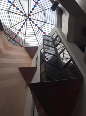 an overhead view of a building with a glass ceiling at Riad Baroud in Marrakech