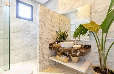 a bathroom with a sink and a mirror at Manzal Vista in Marrakech