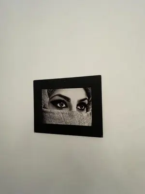 a picture of a persons eyes on a wall at Riad Mama Toutou in Marrakech