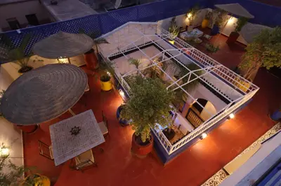 an overhead view of a house with plants and lights at Riad 22 - L'Etoile d'Orient in Marrakech