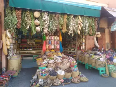 a market with a bunch of food on display at Riad Les Gazelles D'Orient Marrakech in Marrakech