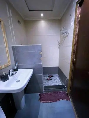 a bathroom with a sink and a shower at Gueliz budget Stay in Marrakech