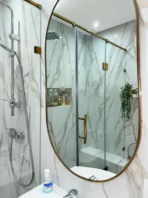 a bathroom with a shower and a mirror at Pierre précieuse au cœur de l'hivernage J40 in Marrakech