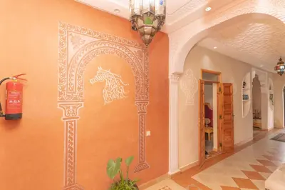 a wall with a painting of a horse on it at Villa Korima in Marrakech