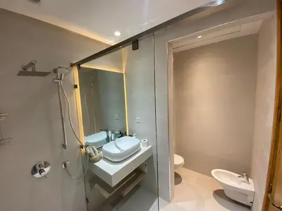 a bathroom with a sink and a shower and a toilet at NEW appartement in palmeraie in Marrakech