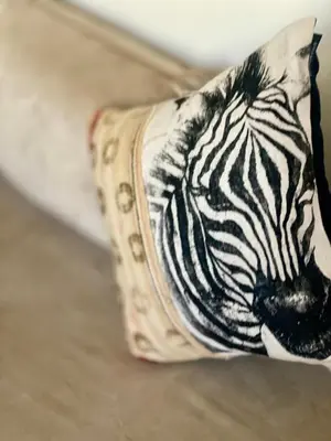 a tie with a picture of a zebra on it at Riad Dollar Des Sables & Spa in Marrakech