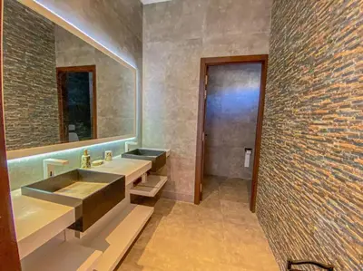 a bathroom with two sinks and a large mirror at Argan Golf Villa 4-bed Marrakech in Marrakech