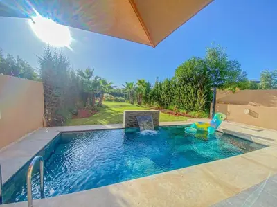 a swimming pool with a toy in the middle at Argan Golf Villa 4-bed Marrakech in Marrakech