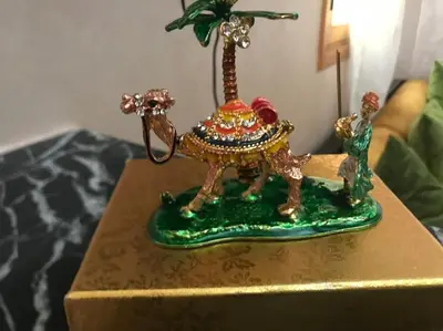 a small figurine of an elephant on a table at Appartement B à 7min de l’aéroport de Marrakech in Marrakech