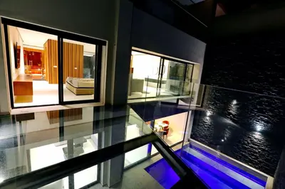 an overhead view of a house with a glass floor at Duplex de luxe, piscine sauna in Marrakech