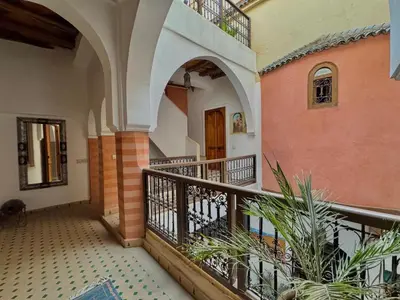 a hallway of a house with a balcony at Riad Rayan in Marrakech