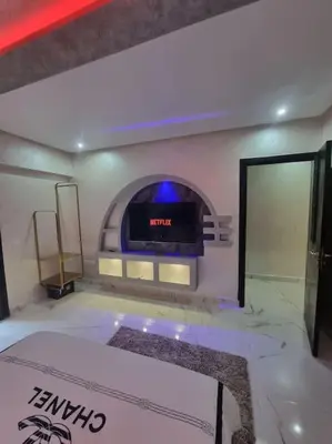 a living room with a pizza oven in a room at Kech vacations Friendly! Luxury 2 bed apartment in Marrakech