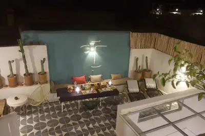 a model of a living room with plants and a table at Riad Pop, a haven in the heart of the Medina in Marrakech
