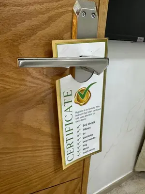 a sign on a door with a banana on it at Modern-elegant Appartement in het centrum in Marrakech