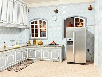 a kitchen with a white refrigerator in a room at Marrakech art in Marrakech