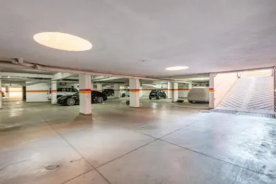 an empty parking garage with cars parked in it at Bohemian Flat in Marrakech