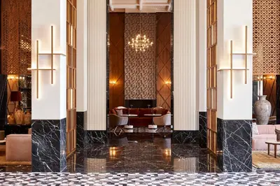 a lobby of a hotel with a chandelier at Park Hyatt Marrakech in Marrakech