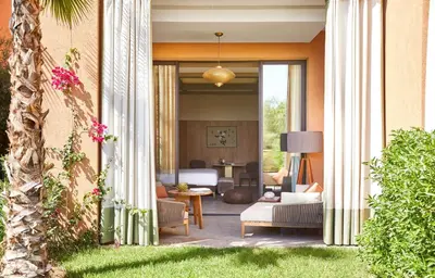 a living room with a couch and a table at Park Hyatt Marrakech in Marrakech
